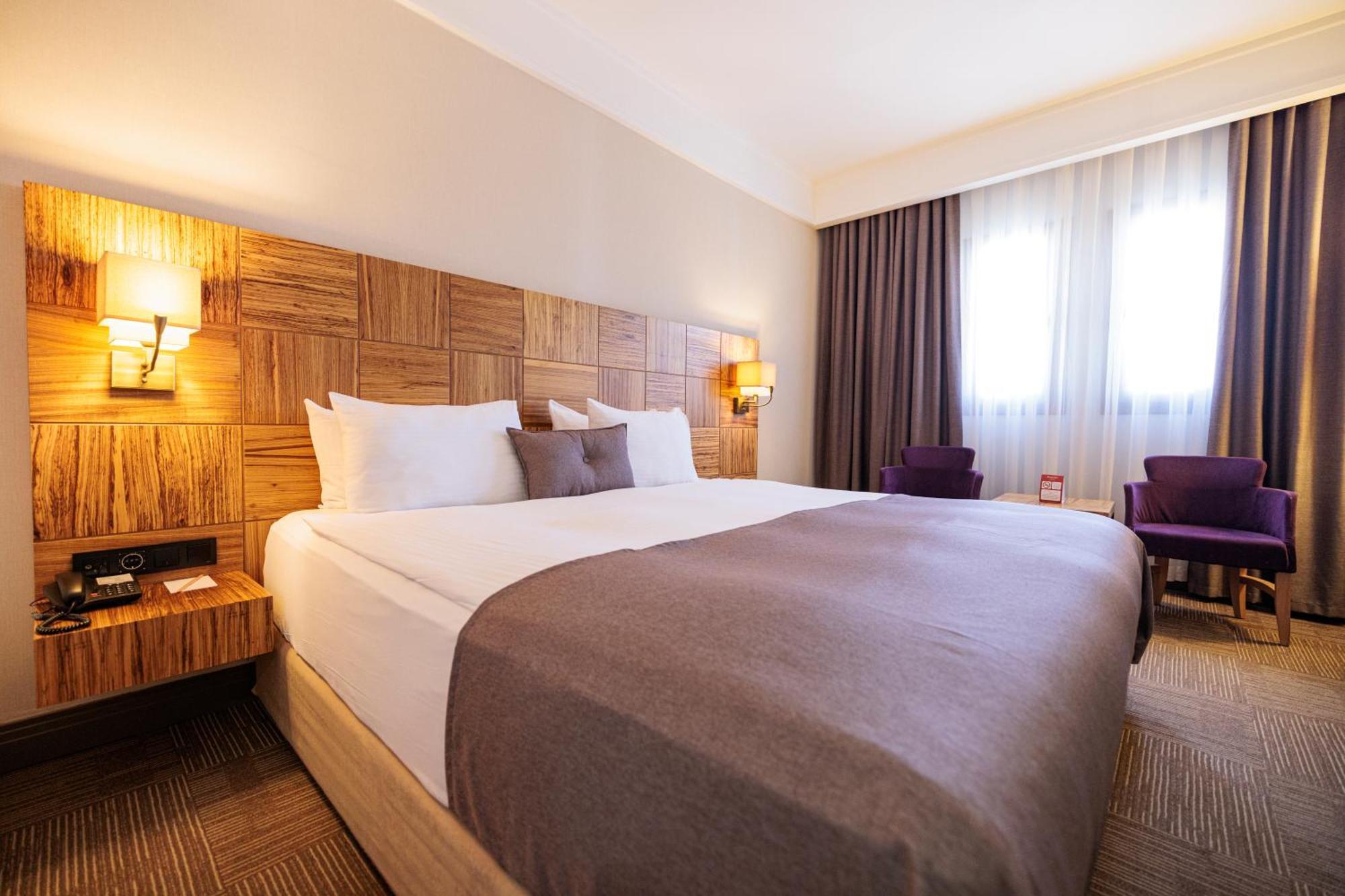 Hotel Ramada By Wyndham Cappadocia à Ortahisar Extérieur photo
